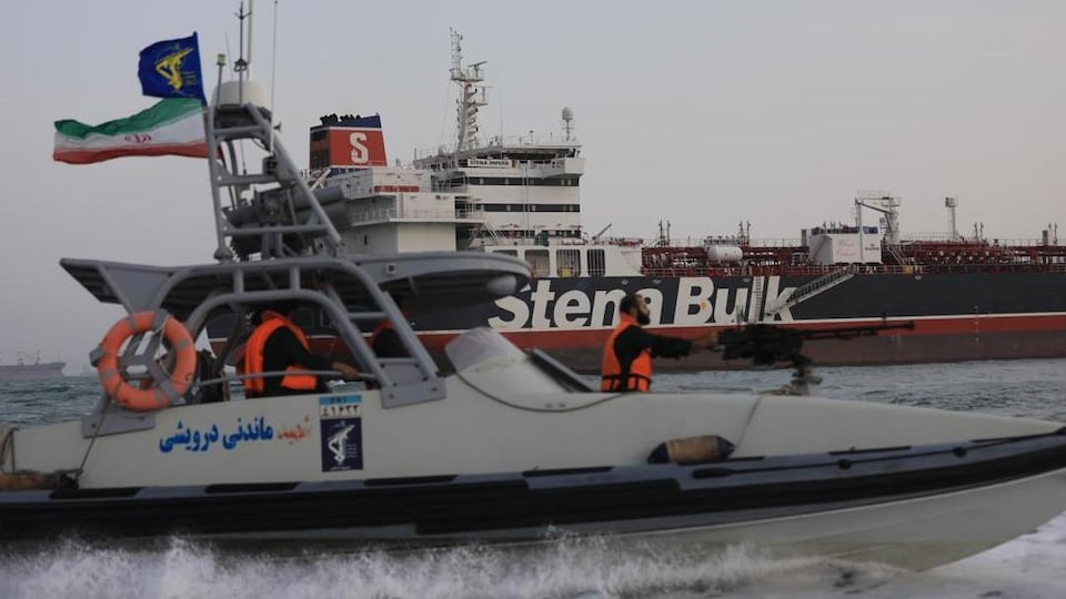 A star of the Islamic Revolutionary Guard Corps with the British tanker Stena Polk in the background. 