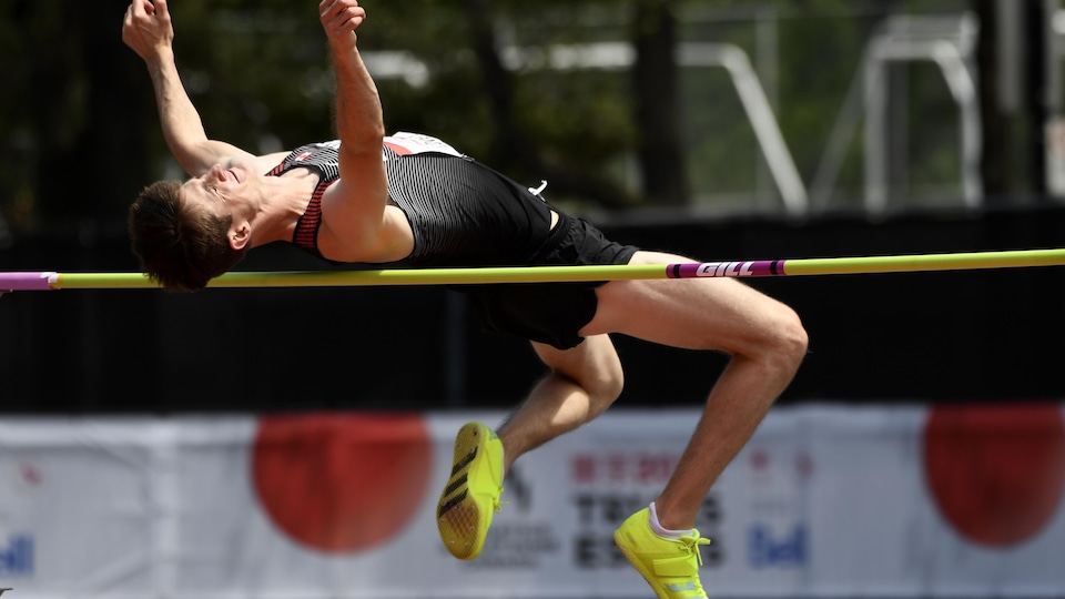 The jumper passed the crossbar at a height of 2.33 meters.