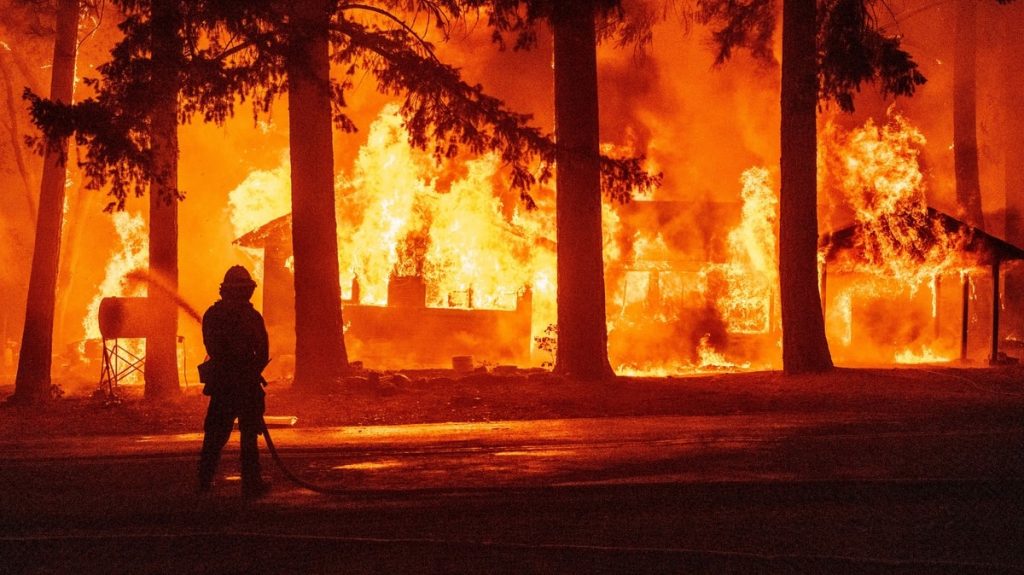 California firefighters face a fire that creates their own atmosphere