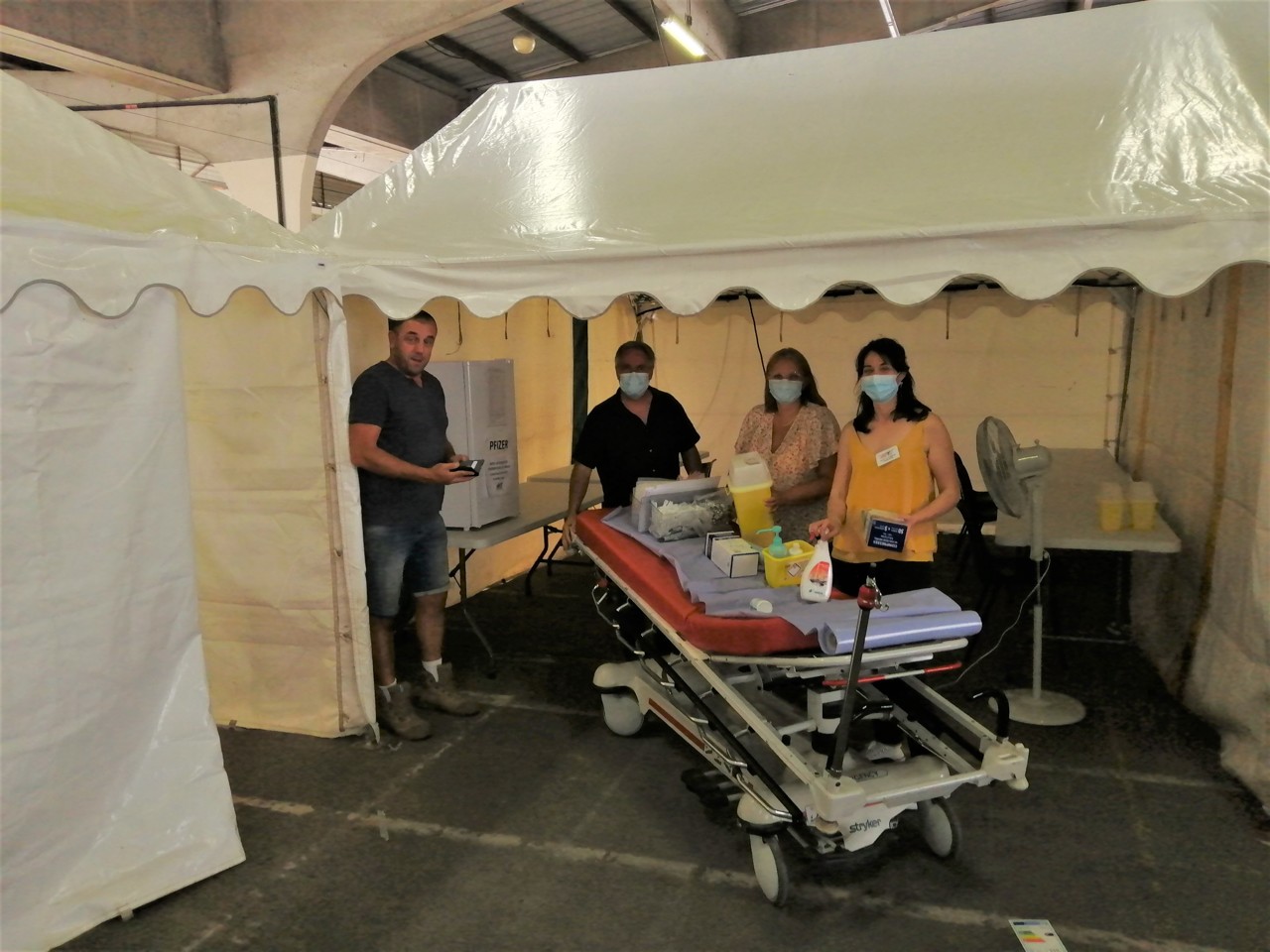 This tent has just been prepared by teams from the town hall and hospital, and this tent will become an area for the preparation of vaccine doses by the nurses.