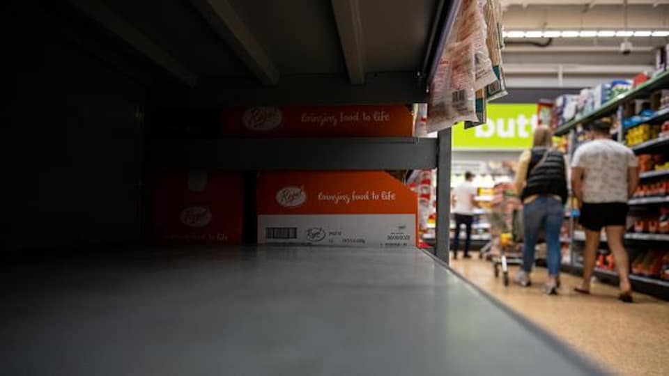 An empty cupboard in the grocery store.