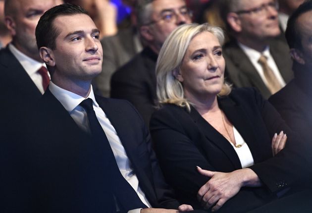 RN executives Jordan Bardella and Marine Le Pen in February