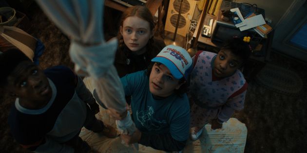 Lucas (Caleb McLaughlin), Max (Sadi Sink), Dustin (Gatien Matarazzo), and Erica (Bria Ferguson) search...