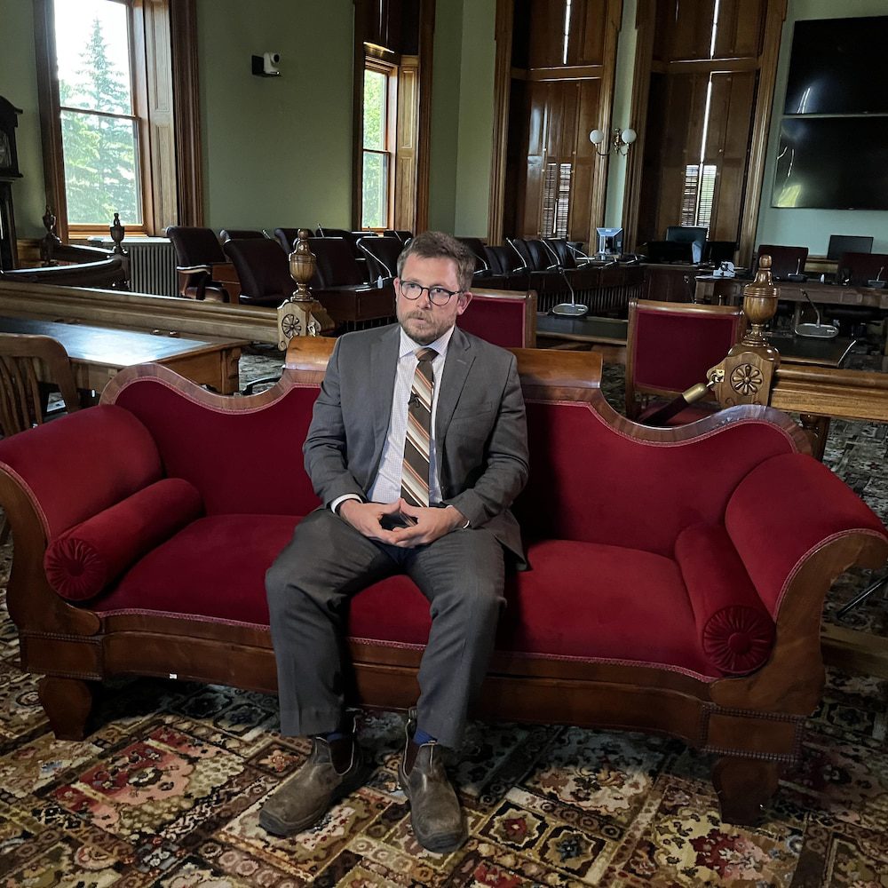 Kevin Arsenault in an armchair.